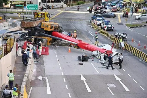 Driver jumps out seconds before van crushed by falling crane in Sengkang, crane operator arrested