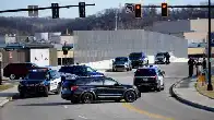 'Hate will never prevail.' Residents confront group displaying swastika flags near I-75