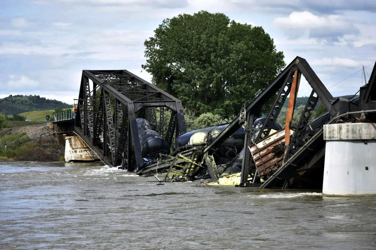 Freight train carrying hot asphalt, molten sulfur plunges into Yellowstone River as bridge fails