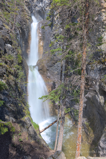 The double falls of Silverton falls as seen from the viewing area, minor rainbow action just below the split.