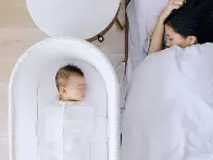 Parents outraged at Snoo after smart bassinet company charges fee to rock crib for crying babies