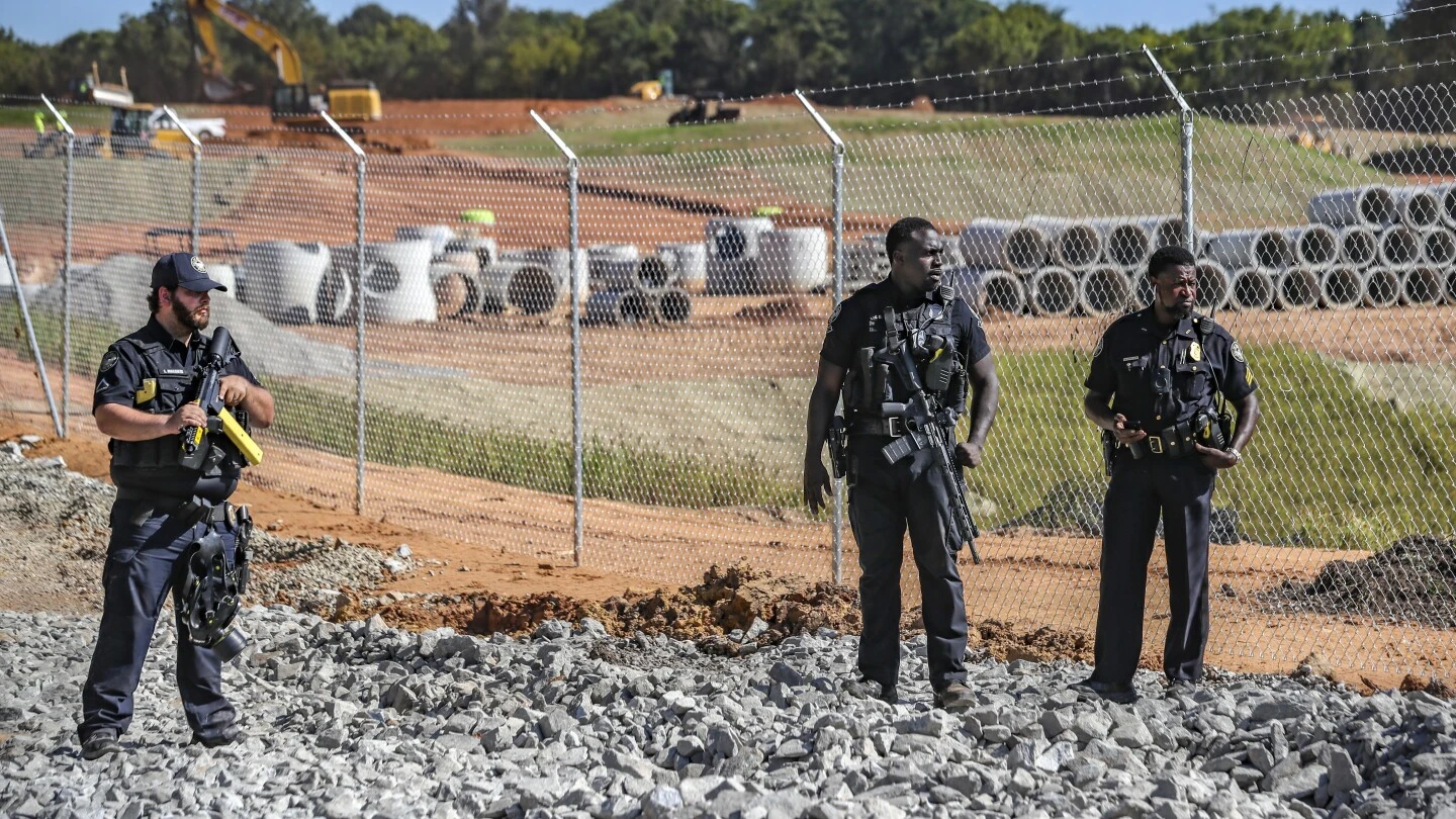 'Stop Cop City' activists arrested after chaining themselves to bulldozer near Atlanta