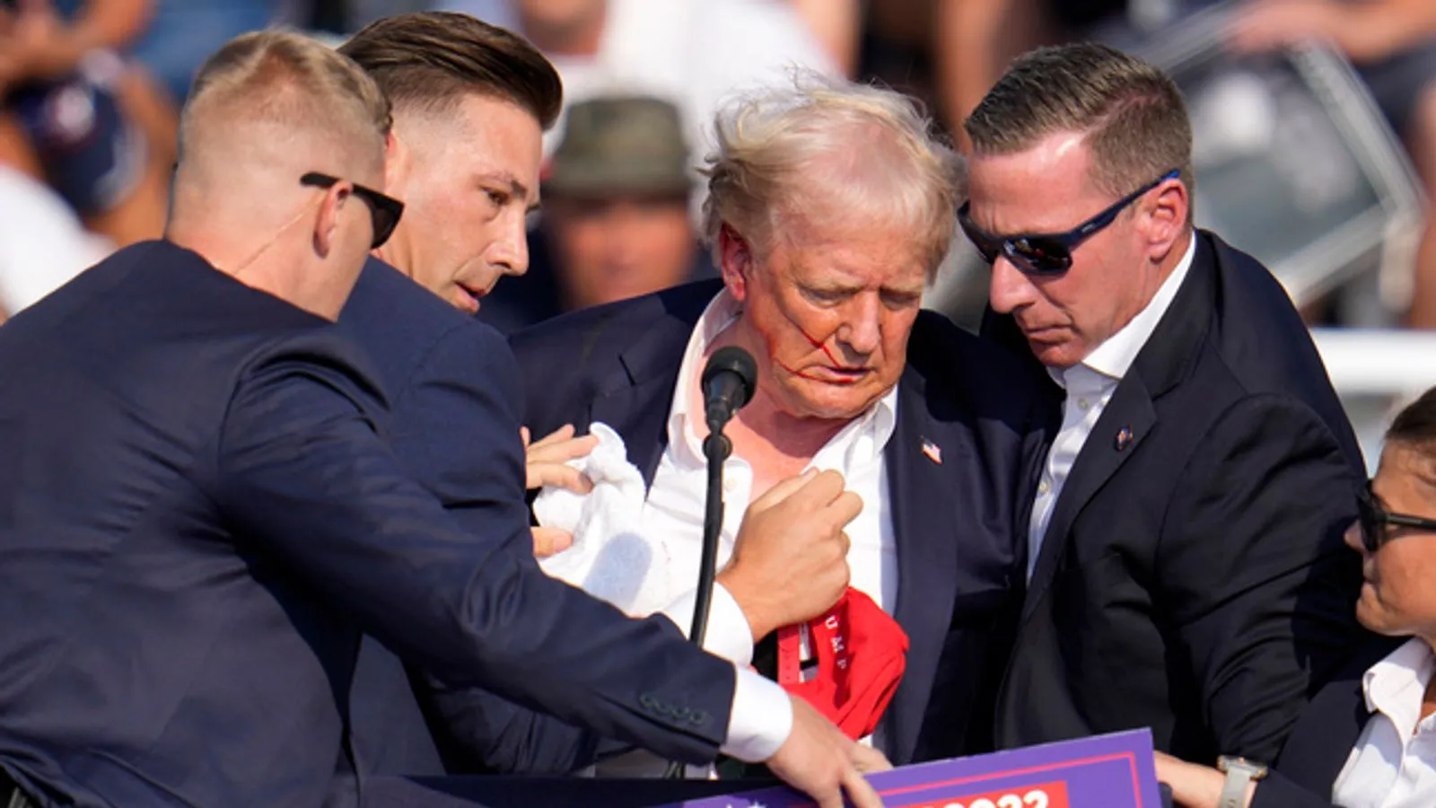 Trump rally shooting: Ex-president injured in assassination attempt at rally that leaves spectator and gunman dead