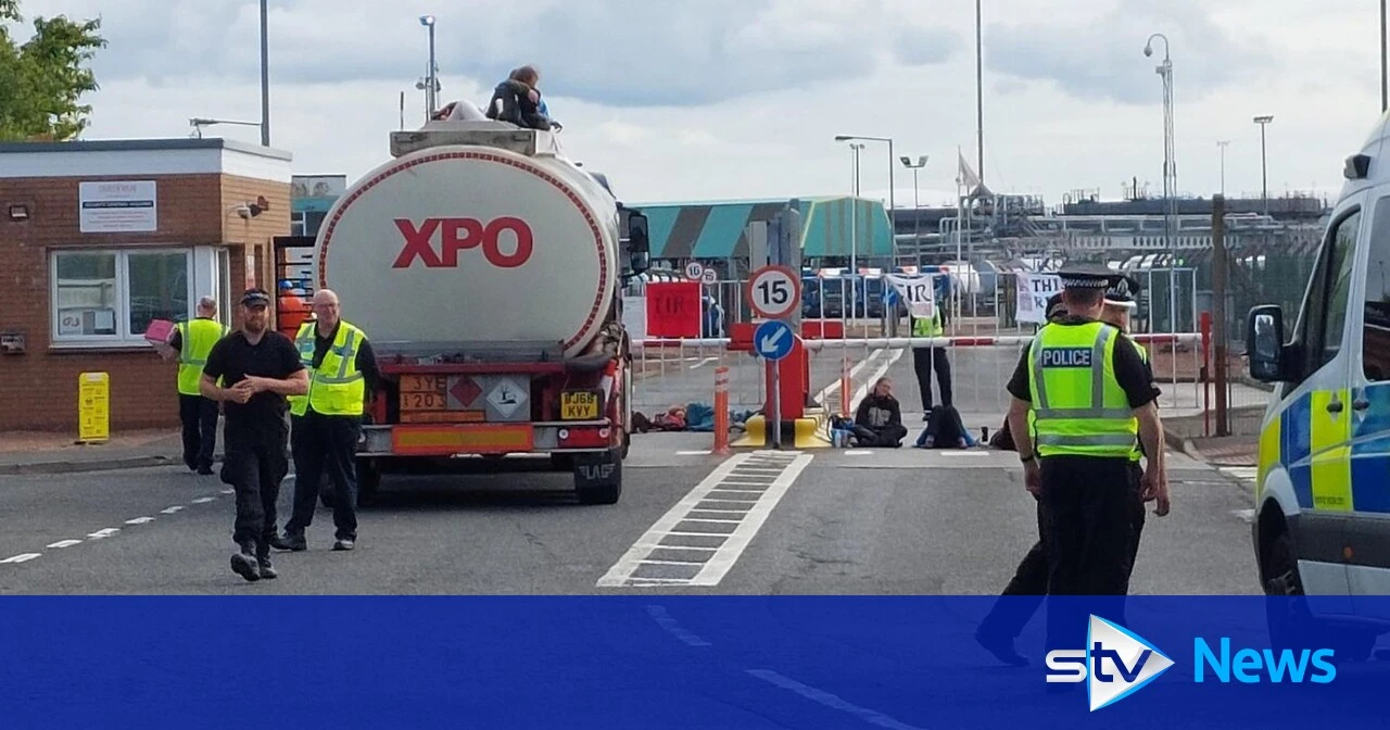 Climate protestors block entrances to two major oil refineries