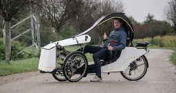 Semi-enclosed recumbent e-trike splits the difference between bike and car