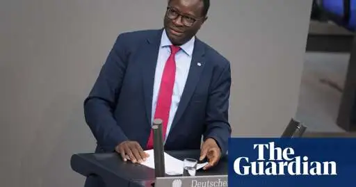 Germany’s first black African-born MP to stand down after racist abuse