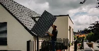 Germans Combat Climate Change From Their Balconies: Plug-and-play solar panels are popping up in yards and on balcony railings across Germany, driven by bargain prices and looser regulations.