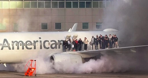 American Airlines plane engine catches fire after landing in Denver