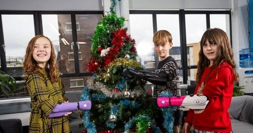 Three children receive 'best Christmas present in the world' - bionic arms