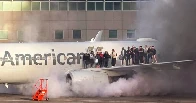 American Airlines plane engine catches fire after landing in Denver